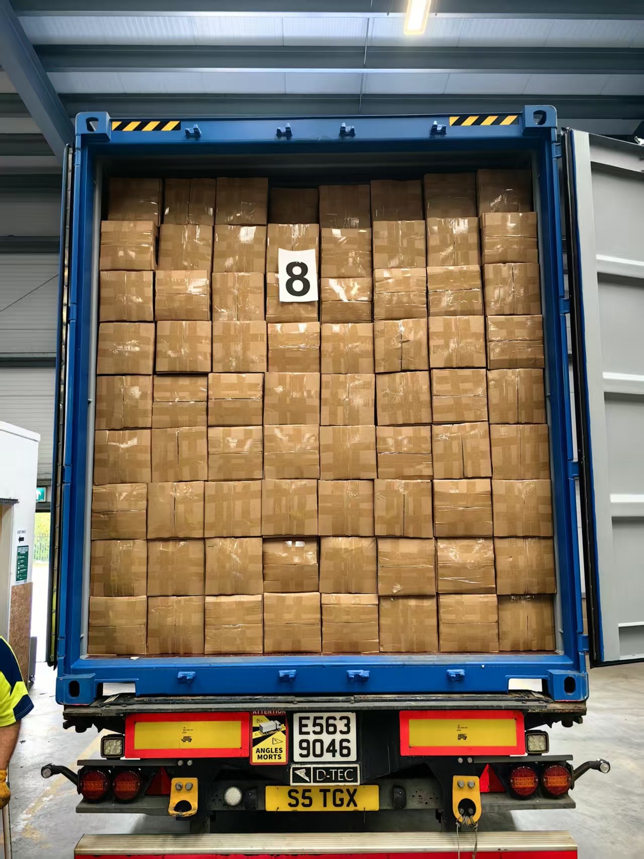 Unload the containers in our new warehouse